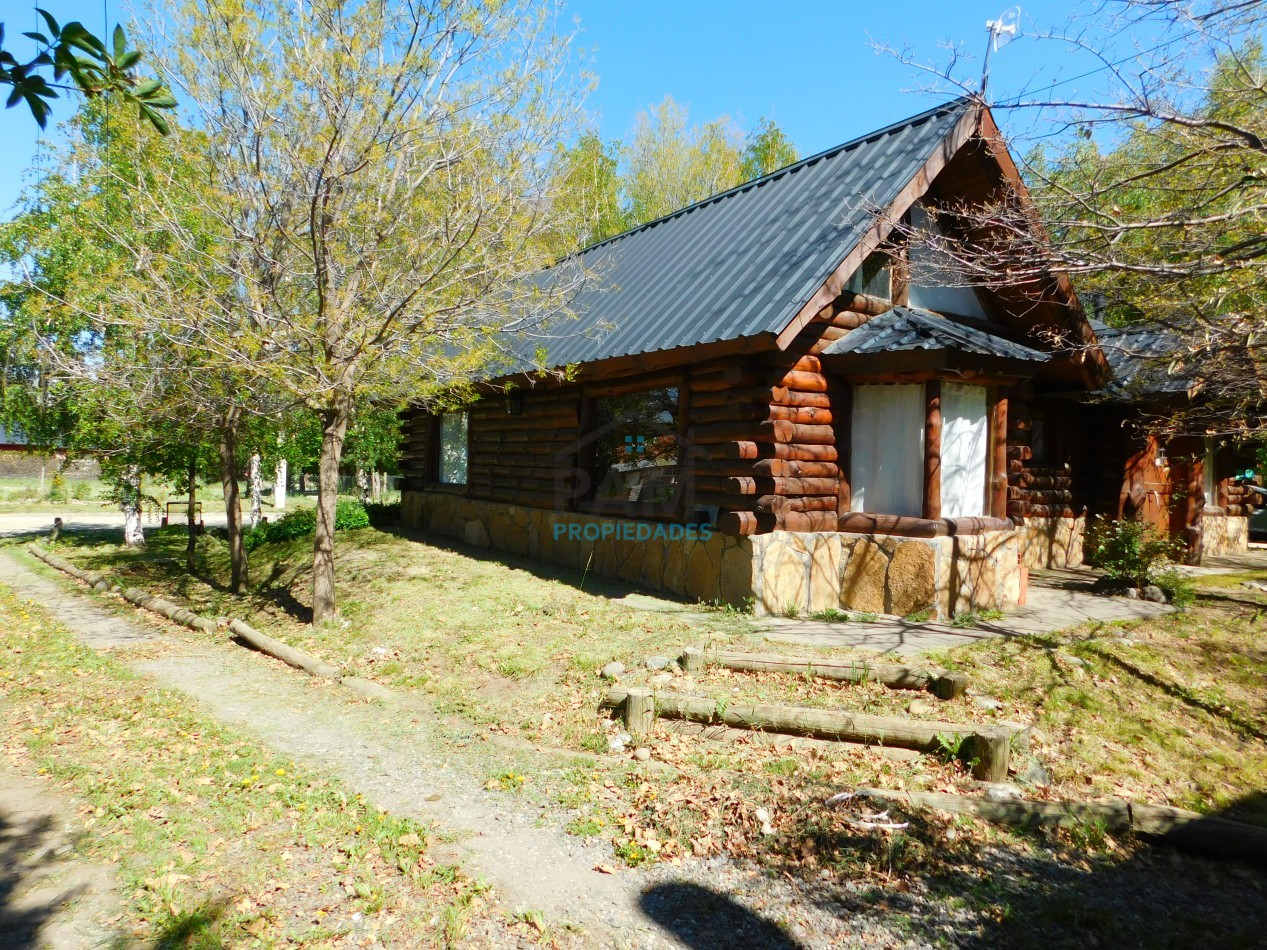 VENTA DE CABAÑA DE TRONCO CON DEPARTAMENTO Y PROYECTO INMOBILIARIO