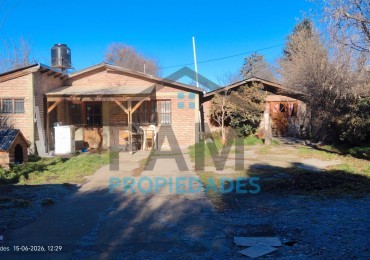 TERRENO CON DOS VIVIENDAS EN VENTA 